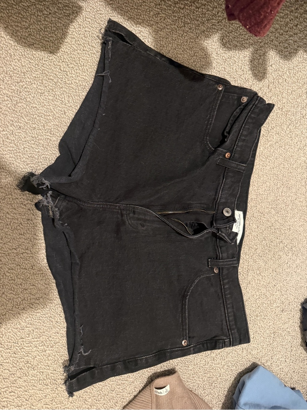Black denim shorts